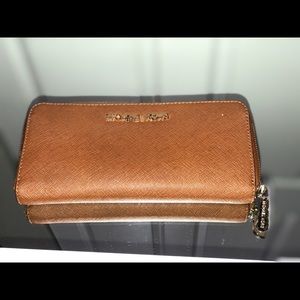 Michael Kors wallet. Used but good condition.